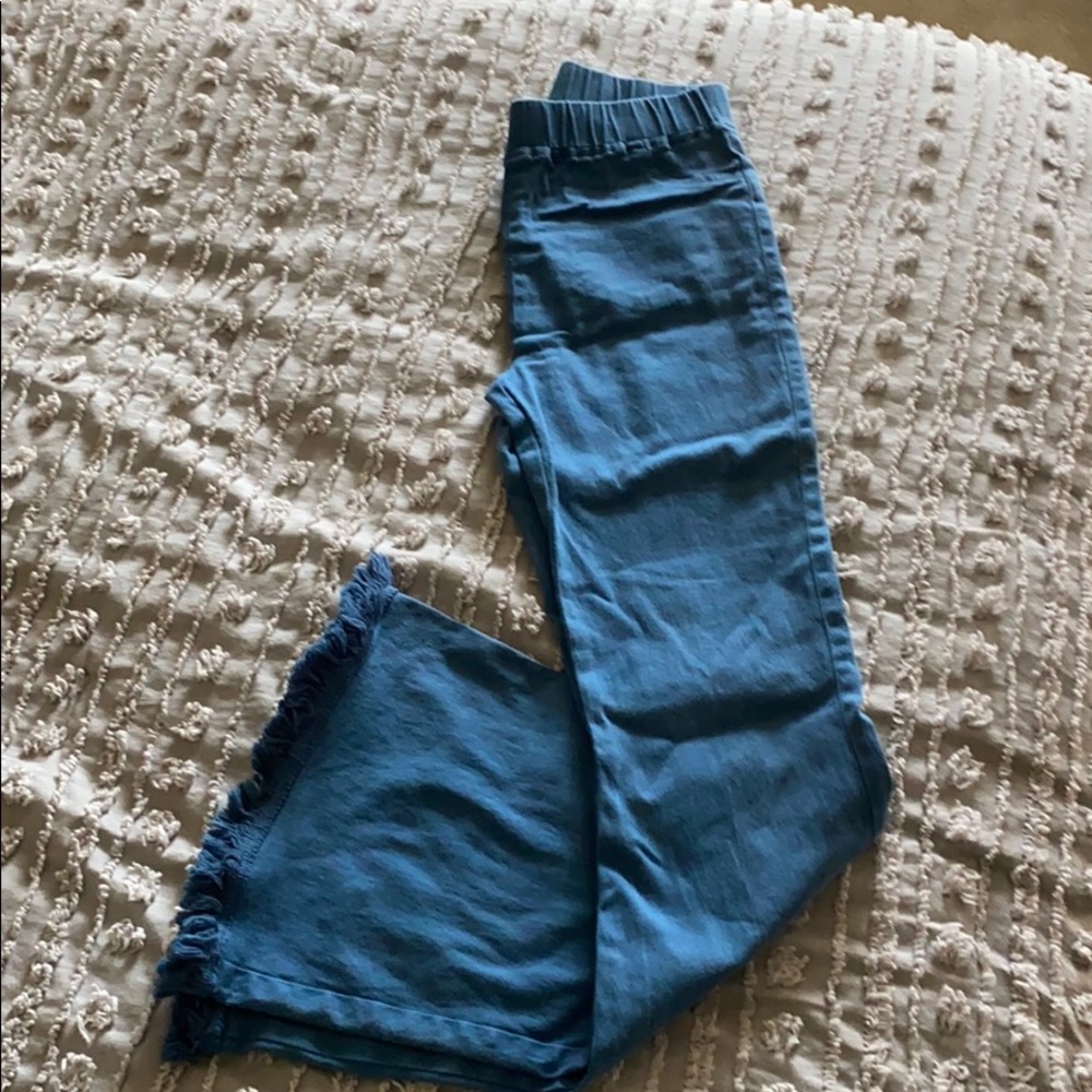 Teal fringe bell bottoms